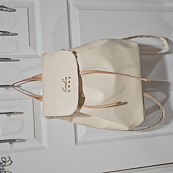 LouLu Handbags - LouLu Backpack NWOT